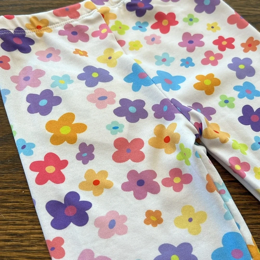 Social Butterfly white leggings with rainbow hearts toddler girl